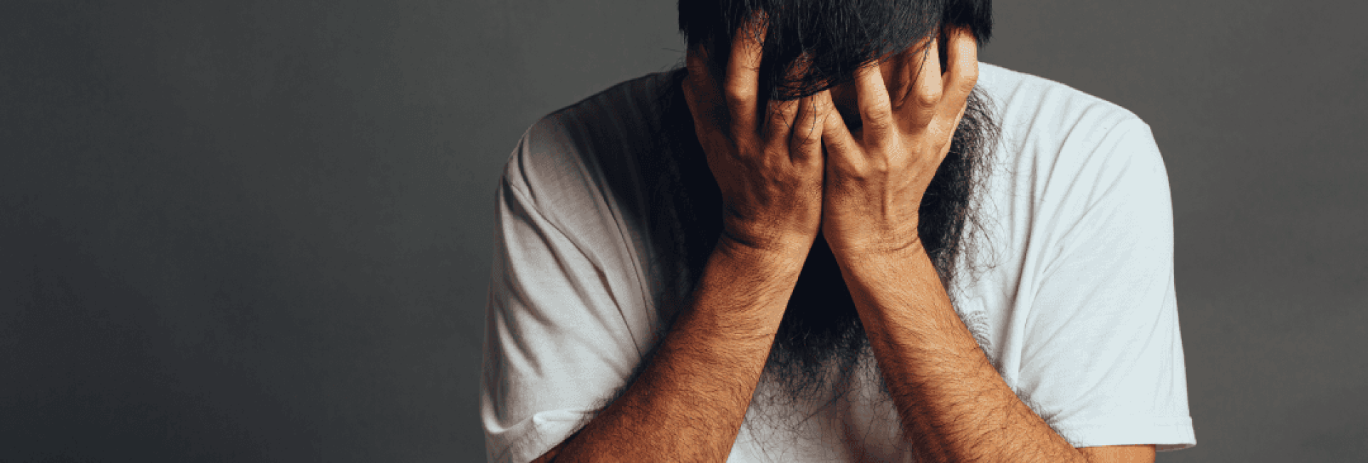 man-stress-out-cover-his-face-by-his-hands